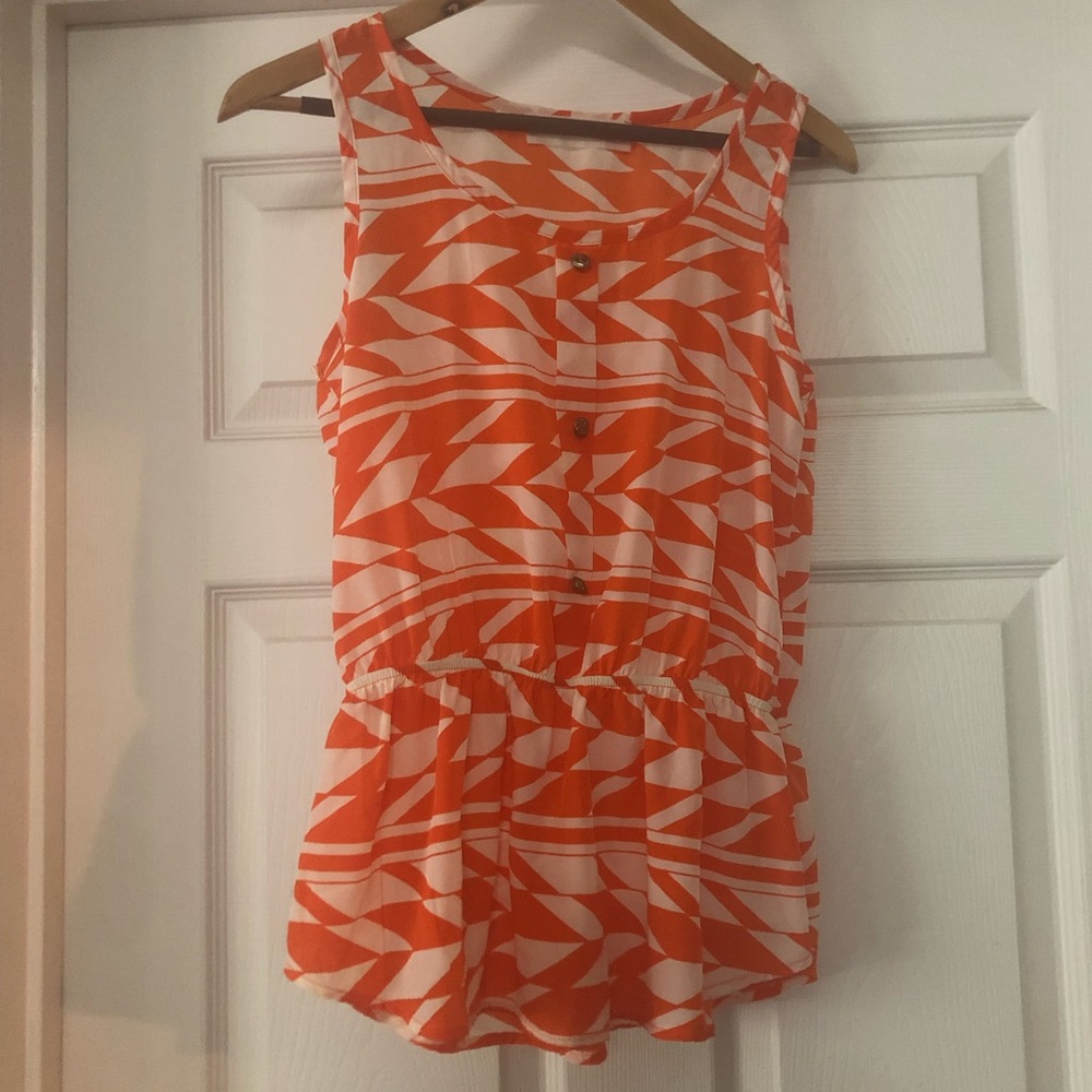 Peaches Love Cream sleeveless peplum blouse